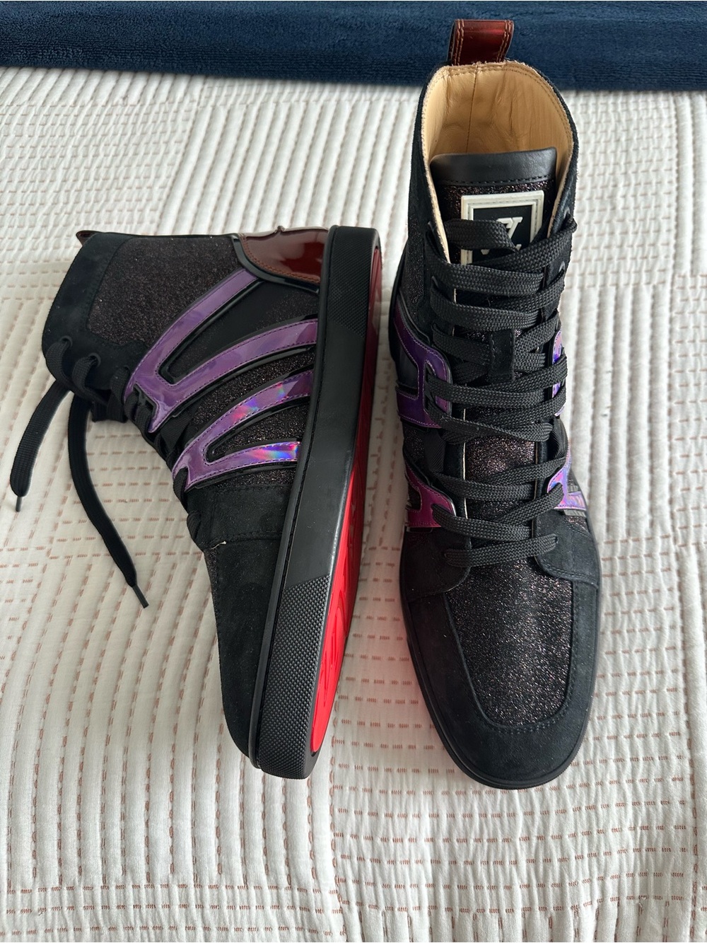 Christian Louboutin Black High-Top Sneakers with Purple Accents and Red Soles
